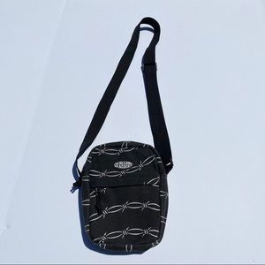 Petals and peacocks barbed wire shoulder bag